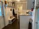 Functional mudroom with storage, bench seating, and convenient access to laundry area at 5871 Oakhurst Dr, Seminole, FL 33772