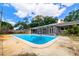 Backyard showcasing the pool with patio and home exterior at 5871 Oakhurst Dr, Seminole, FL 33772