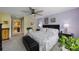 Bright main bedroom with natural light, fresh colors, and a ceiling fan at 6031 Grand Sonata Ave, Lutz, FL 33558