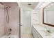 Bathroom with shower, vanity with storage, and neutral color palette at 6058 Waycross Dr, Spring Hill, FL 34606