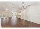 Spacious living room with hardwood floors and a large window offers natural light at 6058 Waycross Dr, Spring Hill, FL 34606