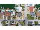 This aerial view showcases waterfront homes, some with pools and docks, in a coastal neighborhood at 6405 2Nd Palm Pt, St Pete Beach, FL 33706