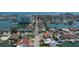 Aerial view of waterfront homes in a neighborhood with canal access and coastal living at 6405 2Nd Palm Pt, St Pete Beach, FL 33706