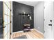Entryway with stylish wall, shoe rack, and convenient coat hooks at 962 Sombra St, Tampa, FL 33619