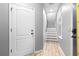 Hallway with staircase and neutral color scheme at 962 Sombra St, Tampa, FL 33619