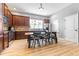 Kitchen featuring wood cabinets, stainless steel appliances, and an island with seating at 962 Sombra St, Tampa, FL 33619