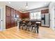 Kitchen featuring wood cabinets, stainless steel appliances, and a large kitchen island at 962 Sombra St, Tampa, FL 33619