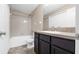Bathroom with tile flooring, neutral walls, and a shower-tub combination at 9752 Trumpet Vine Loop, Trinity, FL 34655