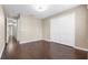 Bedroom with large closet and hardwood floors at 9752 Trumpet Vine Loop, Trinity, FL 34655