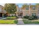 Inviting townhome featuring neat landscaping and a well-maintained exterior at 9752 Trumpet Vine Loop, Trinity, FL 34655