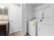 Laundry room with washer and dryer hookups, and wire shelving at 9752 Trumpet Vine Loop, Trinity, FL 34655
