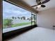 Screened lanai with views of a landscaped yard at 10347 Heron Hideaway Loop, Land O Lakes, FL 34638