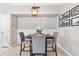 Cozy dining space with modern lighting and comfortable seating at 10412 White Lake Ct, Tampa, FL 33626