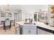 Well-designed kitchen island connecting the dining and living areas at 10412 White Lake Ct, Tampa, FL 33626