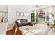 Stylish living room featuring a comfortable seating area and large windows at 10412 White Lake Ct, Tampa, FL 33626