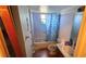 Modest bathroom with a tub, toilet, and sink, offering essential amenities in a compact space at 1107 Goshen Rd, Tarpon Springs, FL 34689