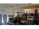 A living room featuring fireplace and view of the upstairs at 1107 Goshen Rd, Tarpon Springs, FL 34689