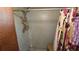 Shower area with tile walls, shower head and shower curtain with clothing rod at 1107 Goshen Rd, Tarpon Springs, FL 34689