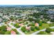 A neighborhood of single-story homes with well-maintained streets and lush greenery at 11334 Winwood Pl # 11334, Port Richey, FL 34668