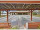 Covered shuffleboard courts with bench seating and shade at 11334 Winwood Pl # 11334, Port Richey, FL 34668