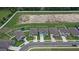 Aerial view of homes, showcasing the neighborhood and its neatly arranged layout with surrounding greenery at 11693 Lavender Loop, Spring Hill, FL 34609