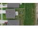 Aerial view of fenced backyard featuring a playset and patio furniture on paver patio at 11693 Lavender Loop, Spring Hill, FL 34609
