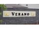 Verano community sign with black lettering and sun logos on a stone base at 11693 Lavender Loop, Spring Hill, FL 34609