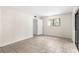 Large room features tiled floor, closet, and window at 11805 Raintree Lake Ln # A, Tampa, FL 33617