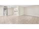Bright, open living area with tile floors and neutral walls, offering versatile space at 11805 Raintree Lake Ln # A, Tampa, FL 33617