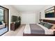 Spacious main bedroom featuring a large window, walk-in closet, and en-suite bath at 11805 Raintree Lake Ln # A, Tampa, FL 33617