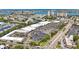 Aerial view of a commercial property with ample parking and close proximity to waterfront and city at 1305 Marion S Dr, St Petersburg, FL 33707