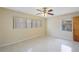 Bright bedroom with two windows for ample natural light and a ceiling fan at 1305 Marion S Dr, St Petersburg, FL 33707