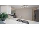 Modern kitchen featuring white counters, subway tile backsplash and stainless steel appliances at 1305 Marion S Dr, St Petersburg, FL 33707