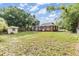 Spacious backyard with shed, offering possibilities for outdoor activities and relaxation at 1511 East Emma St. E St, Tampa, FL 33610