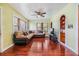Inviting living room with natural light, hardwood floors and built-in shelving at 1511 East Emma St. E St, Tampa, FL 33610