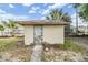 Backyard shed provides extra storage; offers potential for a workshop or hobby space at 1511 East Emma St. E St, Tampa, FL 33610