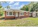 Lovely single story brick home with white trim at 1511 Emma E St, Tampa, FL 33610