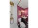 Chic bathroom with unique fixtures, white tiling, and modern vanity at 1558 Cottonwood Ter, Dunedin, FL 34698