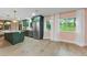 Spacious kitchen with an island, and stainless steel appliances, and natural light at 1558 Cottonwood Ter, Dunedin, FL 34698