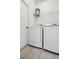 Convenient laundry room area with modern washer and dryer hookups at 16314 Parkstone Palms Ct, Tampa, FL 33647