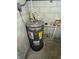 Basement mechanical room with a new Rheem hot water heater at 1807 E Bougainvillea Ave, Tampa, FL 33612