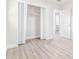 Bedroom featuring closet doors and durable flooring at 1807 E Bougainvillea Ave, Tampa, FL 33612