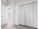 Bedroom featuring closet doors and durable flooring at 1807 E Bougainvillea Ave, Tampa, FL 33612