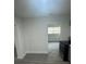 Bright living room featuring sleek hardwood floors, and stylish doorway at 1807 E Bougainvillea Ave, Tampa, FL 33612