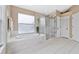 Bathroom with tub, stand-up shower, white tile and neutral-colored walls at 18219 Bittern Ave, Lutz, FL 33558
