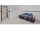 Bedroom features a daybed, carpet, a closet with paneled doors, and a decorative border at 18219 Bittern Ave, Lutz, FL 33558