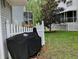 Backyard space featuring a white picket fence, landscaping and view of neighbors at 2015 Vista Del Sol # 108, Lutz, FL 33558
