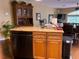 Kitchen area with stainless steel dishwasher and ample cabinetry at 2015 Vista Del Sol # 108, Lutz, FL 33558