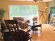 Bright living room with large windows, hardwood floors, plush seating and natural light at 2015 Vista Del Sol # 108, Lutz, FL 33558