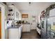Functional kitchen with white cabinets, stainless steel appliances, and a view of backyard, making meal preparation convenient at 216 W South Ave, Tampa, FL 33603